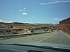 zq) Approaching Bridge at Mexican Hat We Passed (Other Direction) Couple of Days Ago (Monument Valley to Bluff).JPG