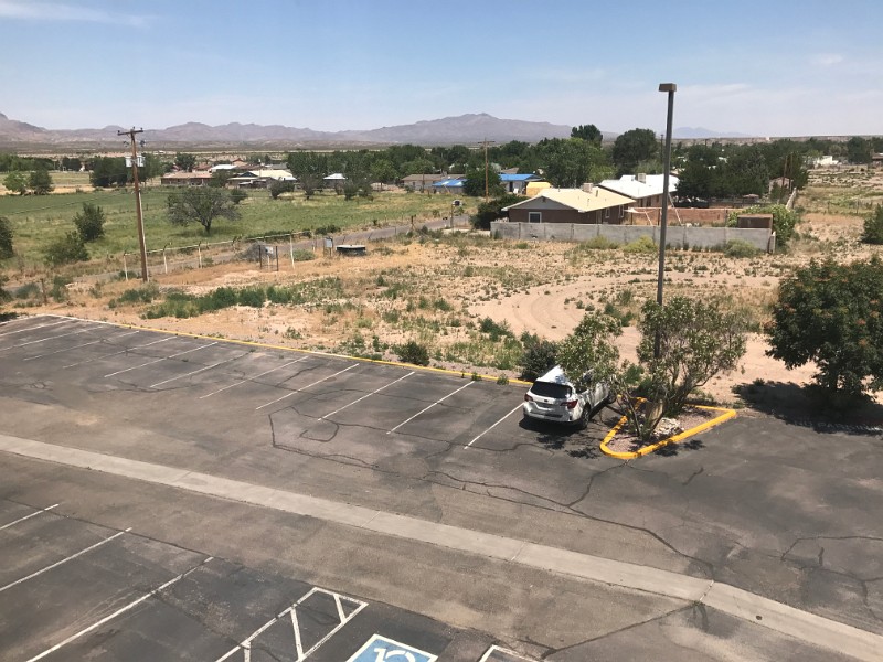 c) The Alice All By Herself (ParkingLot, Comfort Inn + Suites Socorro, New Mexico)