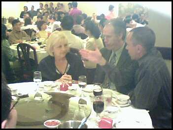 l) David in conversation with Diane+Ron Surak (Cell-Phone Picture).jpg