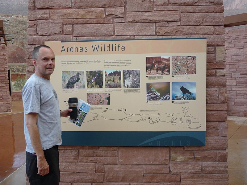 zzzr) Reading The Informative Displays Outside Visitor Center (Also Freshening Up+Changing Clothes In The Restrooms).JPG