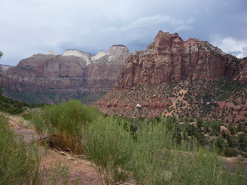 zc) The Tunnel Divides The Park With The Red Colored Rock On One Side And The Patterned White Slick Rock On The Other.JPG